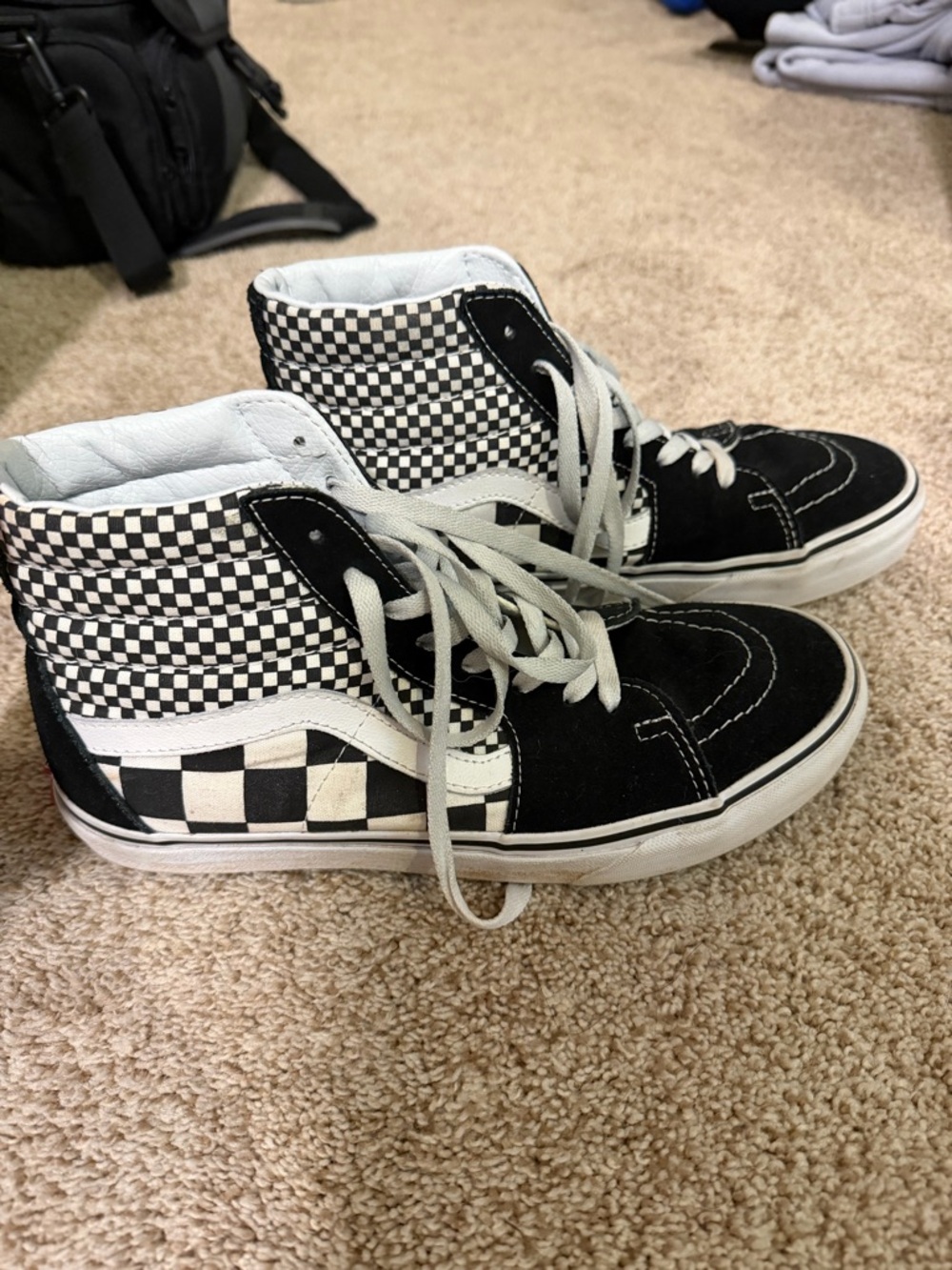 Vans Black and White Checkerboard Sk8-Hi High Top Sneakers